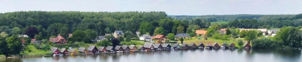 Bild im Header zeigt Bootshuser am Mirower See